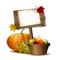 Old Wooden banner with Orange pumpkin, Autumnal leaves and basket full ripe apples Royalty Free Stock Photo