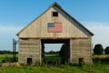 Old wooden barn with American Flag Royalty Free Stock Photo