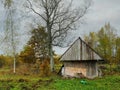 Old wooden barn, Autumn winter season, Green grass, Abandon farm. Cloudy sky