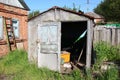 Old wooden barn with different tools Royalty Free Stock Photo