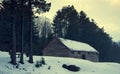 Old, wooden barrack in the forest