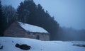 Old, wooden barrack in the forest