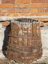 Old wooden barrel with ferruginous rings