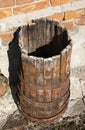 Old wooden barrel with ferruginous rings