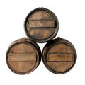 Old wooden barrels isolated on a white or transparent background. Barrels for storing whiskey or cognac are stacked in a Royalty Free Stock Photo