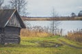 Old wooden bath on the lake shore Royalty Free Stock Photo