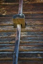 Old wooden beam construction. Texture of old stratified and rotten wood, abstract background. Old Weathered Rotten Cracked Knotted Royalty Free Stock Photo