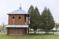 The old wooden bell tower near the church, Western Ukraine