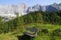 a wooden bench in the Austrian Alps in the Dachstein region (Austria)