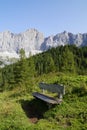 a wooden bench in the Austrian Alps in the Dachstein (Styria) region (Austria)