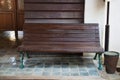 Old wooden bench in public train station Royalty Free Stock Photo