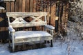 Old wooden bench after snowfall Royalty Free Stock Photo