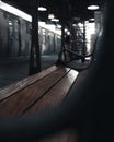 Old wooden bench on a train station Royalty Free Stock Photo