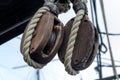 Old wooden block pulleys and rope Royalty Free Stock Photo