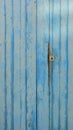 Old wooden blue door with rusty lock Royalty Free Stock Photo