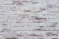 Old wooden board. Wooden wall with a shabby old paint. Fence. Wood texture. Cross section of the tree. Background