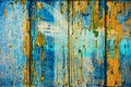 Old wooden boards with flaking blue paint
