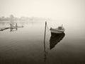 Old wooden boat in fog, black and white Royalty Free Stock Photo