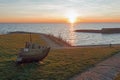 Old wooden boat in the harbor of Laaxum Friesland the Netherlands at sunset Royalty Free Stock Photo