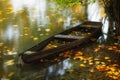 Old wooden boat on the lake in autumn Royalty Free Stock Photo