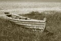 Old wooden boat on the lake bank Royalty Free Stock Photo