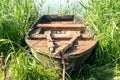 Old wooden boat on the lake bank Royalty Free Stock Photo