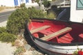 Old wooden boat lying on the shore, selective focus Royalty Free Stock Photo