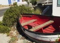 Old wooden boat lying on the shore, selective focus Royalty Free Stock Photo