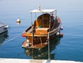 Old wooden boat moored at pier Royalty Free Stock Photo