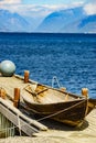 Old boat on pier, norway fjord Royalty Free Stock Photo