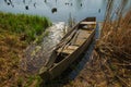 Old wooden boat on the river bank Royalty Free Stock Photo