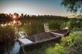 Old wooden boat by the river, beautiful scenery Royalty Free Stock Photo