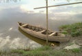 Old wooden boat on the river or lake bank. Royalty Free Stock Photo