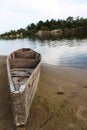 Old wooden boat at river shore Royalty Free Stock Photo