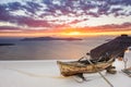 Old wooden boat on roof in Firostefani, Santorini island, Greece