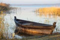 Old Wooden Boat On The Shore Of Lake Zuvintas At Sunrise, Nature Landscape, Lithuania, Tranquil Early Morning