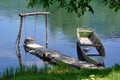 Old wooden boat on slow river