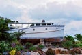 Old Wooden Boat Suspended On Dry Land