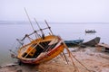 Old wooden boat which is to be fix on the banks of the River Ganges Royalty Free Stock Photo