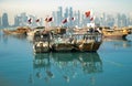Qatar Flags on Traditional Boats in Corniche Harbor - Doha, Qatar Royalty Free Stock Photo