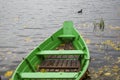 Old wooden boats near the beach of Trakai Gavle lake . Autumn and fall time