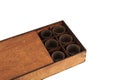 Old wooden box with wooden glasses inside Royalty Free Stock Photo