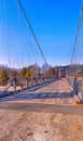 Old wooden bridge across the Hallingdalselva river flowing into Lake Kroderen in Norway Royalty Free Stock Photo