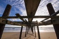 Old wooden bridge at Natai beach with beautiful sky