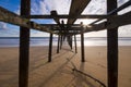 Old wooden bridge at Natai beach with beautiful sky