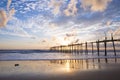 Old wooden bridge at Natai beach with beautiful sky