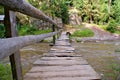 Old wooden bridge over Aries River