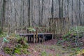 Old wooden bridge over a dry stream leading to what was a farmyard in the late Middle Ages Royalty Free Stock Photo