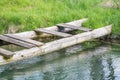 old wooden bridge over pond Royalty Free Stock Photo