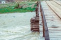 old wooden bridge over the river Royalty Free Stock Photo